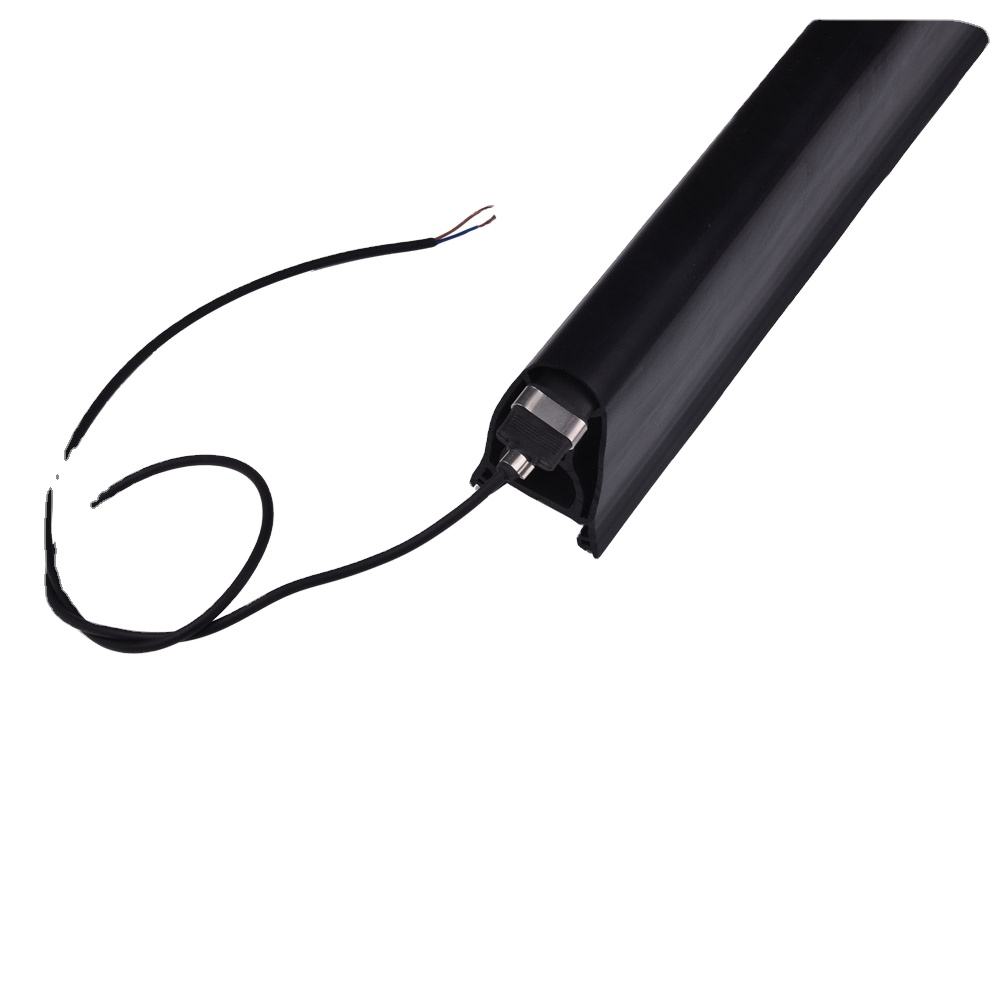 Integrated Safety Edge for Garage Door Bottom